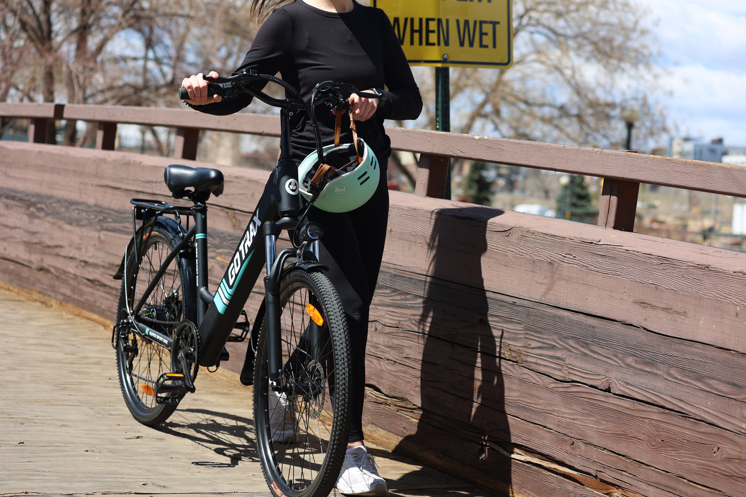 Woman with GOTRAX Black Endura Electric Bike with Step-Through Design
